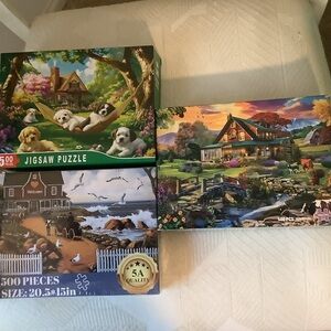 Puzzles: three puzzles with letters on back and 500 pieces each